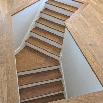 Stairs and floors installed by Flooring Hardwood Plus