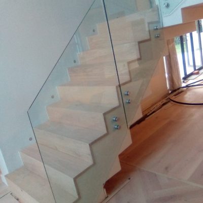 Stairs and floors installed by Flooring Hardwood Plus